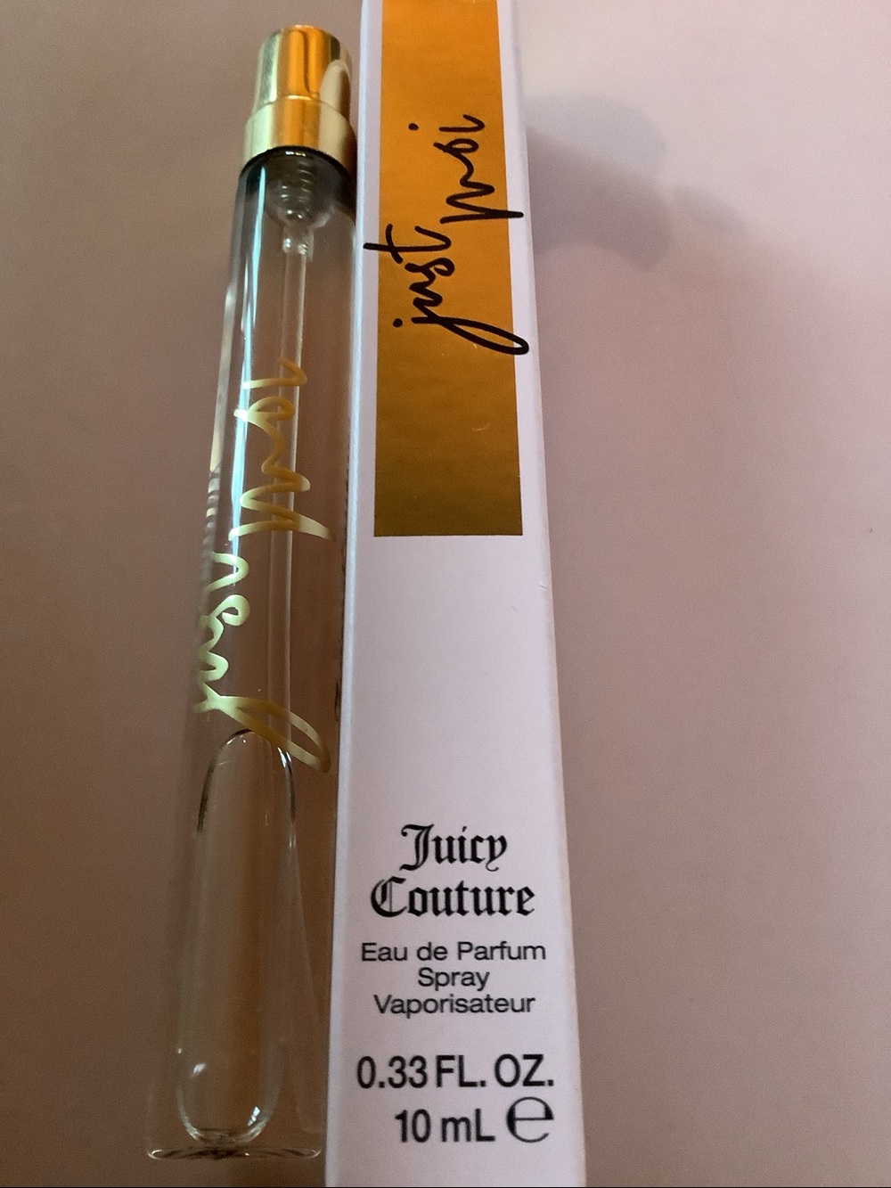 Juicy Couture Just Me Eau de Parfum Spray - Pink/Gold 10 mil ravelbottle